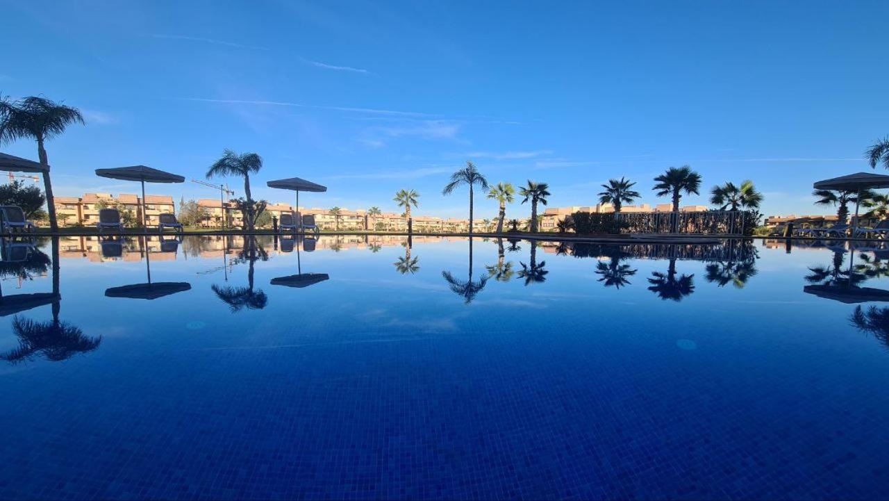 Mini-Villa Situee Dans Une Residence Prestigia A Marrakech, Avec Une Vue Sur La Piscine Et Le Golf Une Securite 24H Sur 24 Et Une Proximite Ideale De L Aeroport 5 Minutes C Est Une Offre Parfaite Pour Des Vacances Marrakesh Exterior photo